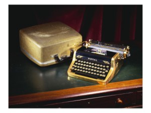A royal quiet-de-lux-portable typewriter with gold plated body and fittings